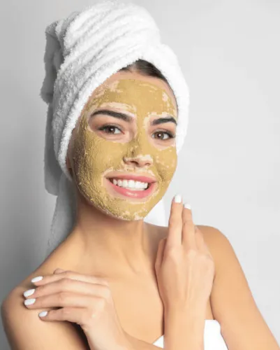 Best Cosmelan Peel Treatment Procedures In Chennai Woman wearing a face mask on her head, potentially for protection or cosmelan peel treatment.