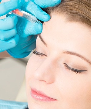 Botox treatment for forehead lines to relax muscles, smooth wrinkles, and prevent new creases