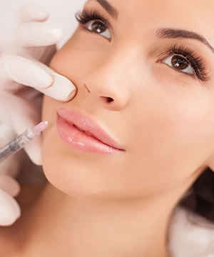 Lip flip and perioral Botox treatment to relax mouth muscles, refine lip shape, and soften fine lines