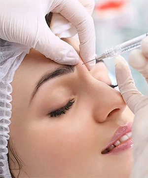 Glabella Botox treatment reduces frown lines between eyebrows and softens tension from stress