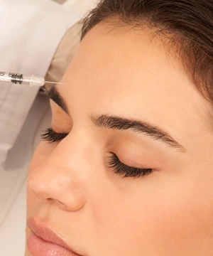 Botox treatment for forehead lines to relax muscles, smooth wrinkles, and prevent new creases