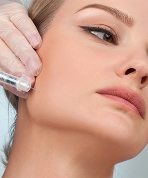 Jawline and chin Botox treatment to relax tight muscles, enhance lower-face contour, and improve balance
