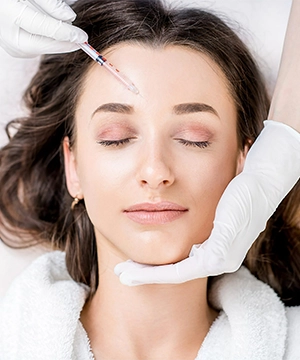 Botox treatment for forehead lines to relax muscles, smooth wrinkles, and prevent new creases